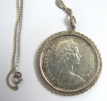 Münzanhänger mit einer kanadischen 1-Dollar-Silber