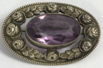 Art Nouveau brooch, made of alpaca and set with am