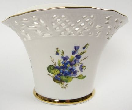 Vintage porcelain vase with a delicate openwork pa