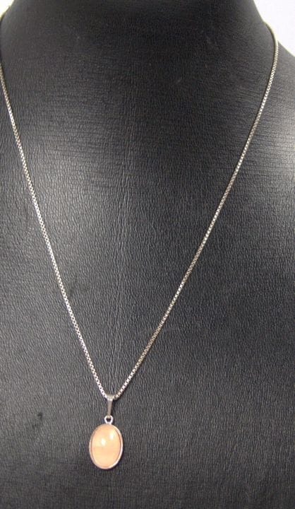 925 sterling silver necklace set with rose quartz.