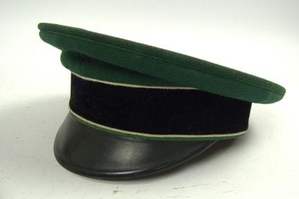 Field cap / peaked cap, likely belonging to an Arm