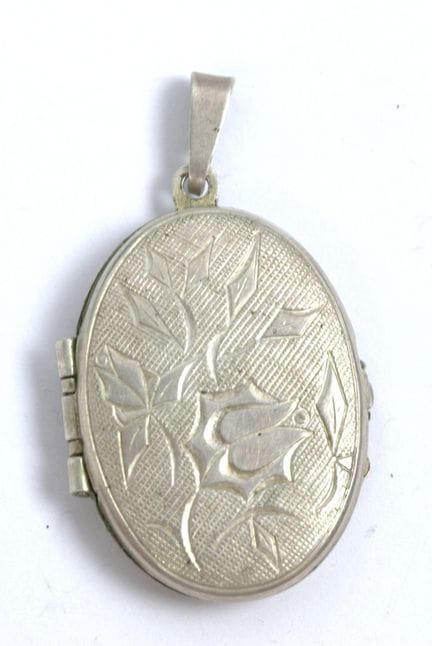 Medaglione, argento 835.