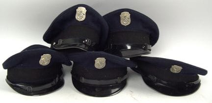Firefighter caps made of dark blue fabric with a b