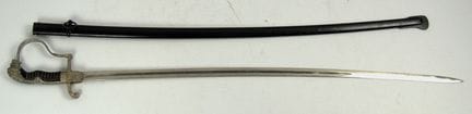 Sable de oficial con pomo de león y vaina, Tercer 