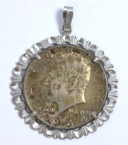 Dollaro Kennedy con montatura in argento.