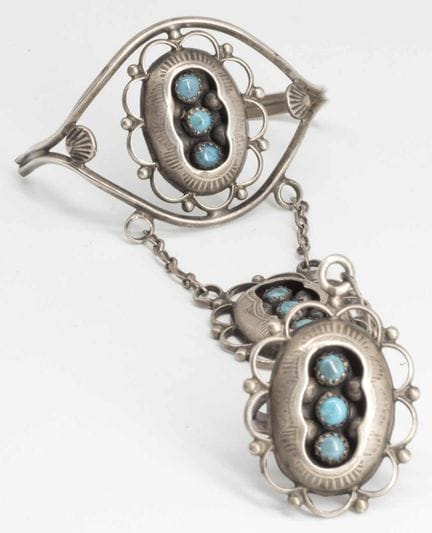 Navajo silver bracelet with a ring and turquoise e