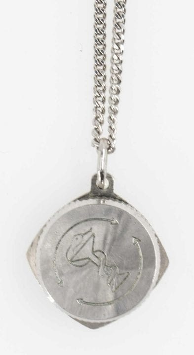 "SOS-Talisman" screw-on SOS emergency capsule on a