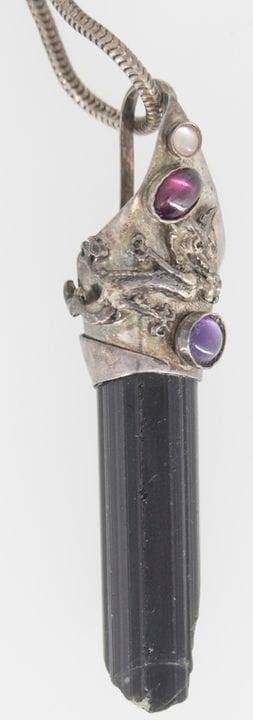 A chain hallmarked 900 silver, with a tourmaline p