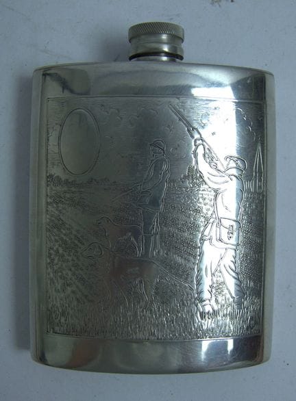 Pewter hip flask with an engraved hunting scene, h