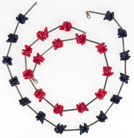 A 925 sterling silver necklace set with red and bl