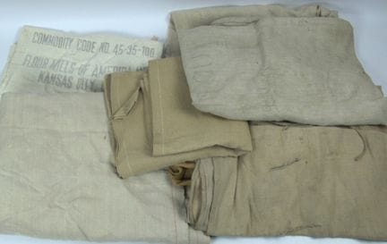 A large number of old flour and food sacks from a 