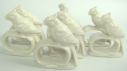 Sieben Serviettenhalter in Vogelform, Keramik. Ein