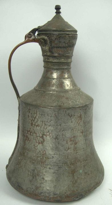 Antique hand-hammered metal pitcher, galvanized co