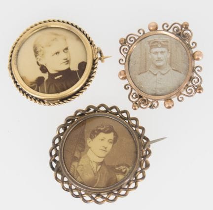 Three Art Nouveau photo brooches.