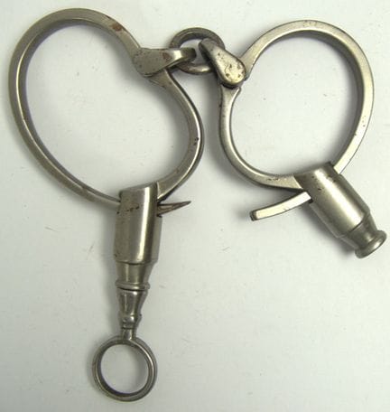 Darby-style handcuffs with screw locks. Not tested