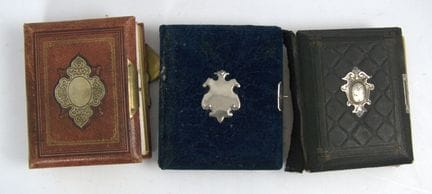 Three small Art Nouveau photo albums from a liquid
