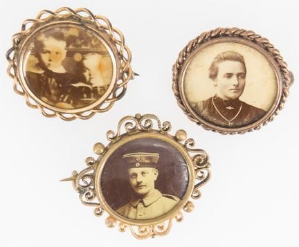 Three Art Nouveau photo brooches.