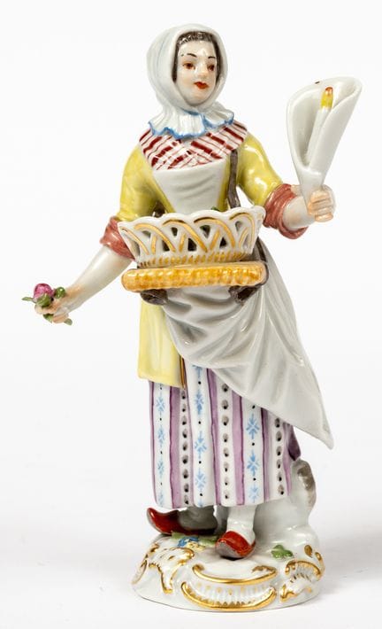 FIGURINE DE MEISSEN « LA VENDEUSE DE FLEURS »
Manu