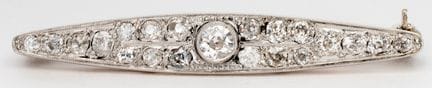 BROCHE ART DÉCO AVEC UN DIAMANT DE TAILLE ANCIENNE