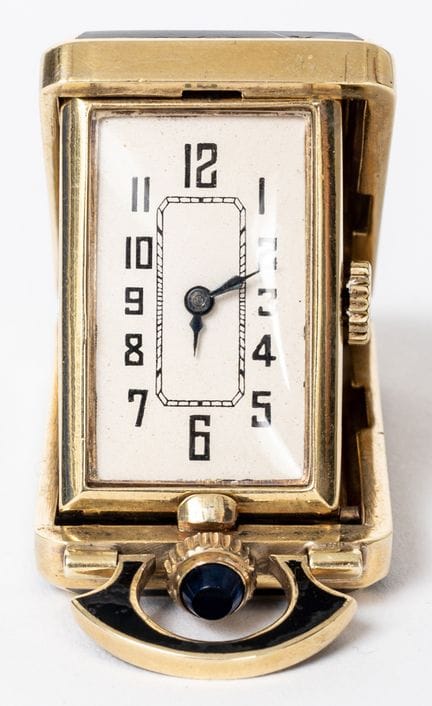 HORLOGE DE VOYAGE POUR FEMMES EN OR ET ÉMAIL VERT
