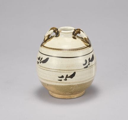 Un jarrón de Cizhou con dos asas. Un jarrón de Ciz