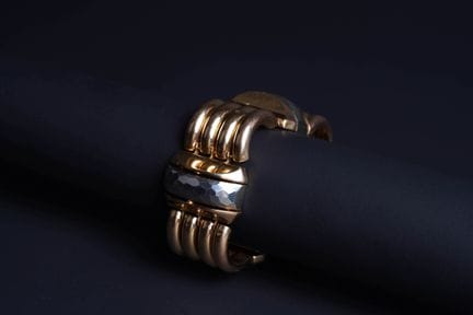 Articulated tank bracelet in 18K yellow and white 
