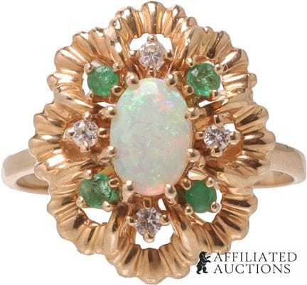 Bague en or 14 carats sertie de diamants, d'émerau