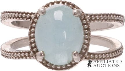 Bague avec aigue-marine en cabochon en argent 925.