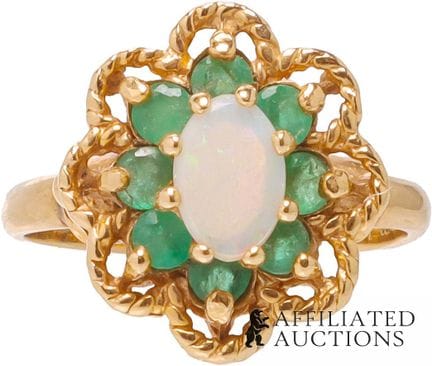 Bague en or jaune 14 carats avec opale et émeraude