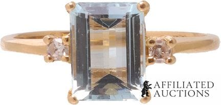 Bague en or jaune 14 carats avec aigue-marine et d