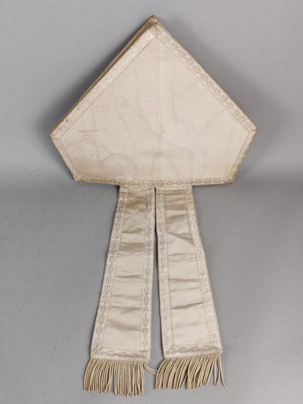 Bishop's miter made of white moiré silk fabric wit