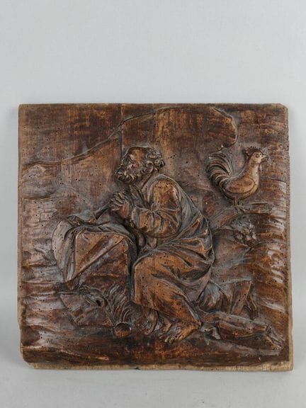 Flachrelief aus geschnitztem Holz, das die Verleug