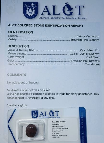 6.70克拉的粉红蓝宝石，附带保证证书，该证书是商品描述的组成部分。我们可以按以下固定运费为您寄送货