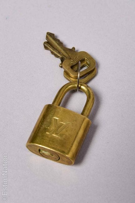 LOUIS VUITTON VINTAGE
LUCCHETTO con due chiavi in 