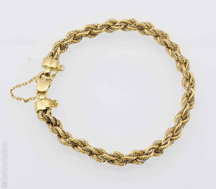 BRACELET EN OR JAUNE ET OR GRIS TORSADE
Bracelet e