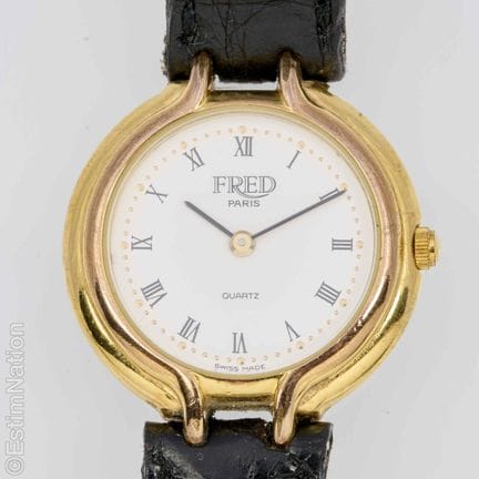 FRED. 
Montre de dame en acier et plaqué or, boiti