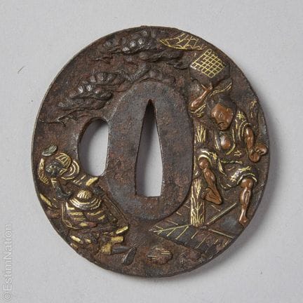 ARTE ASIÁTICO
Nagamaru gata tsuba de hierro con in