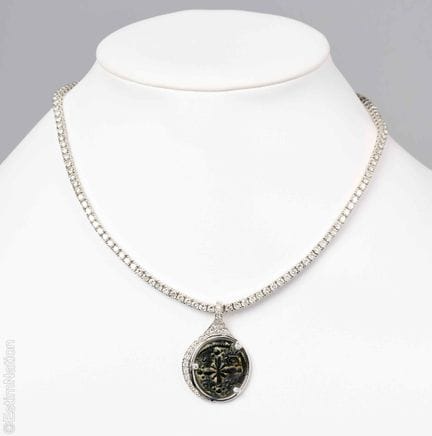 COLLIER OR GRIS ET DIAMANTS
Collier rivière en or 
