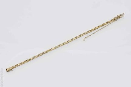 BRACELET TORSADE EN OR DE DEUX COULEURS
Fin Bracel
