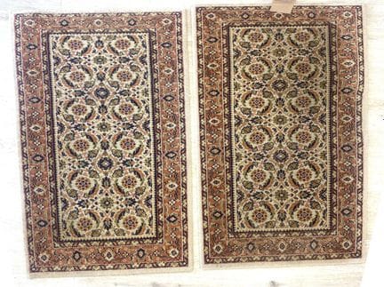 DEUX TAPIS en laine polychrome à deux registres de