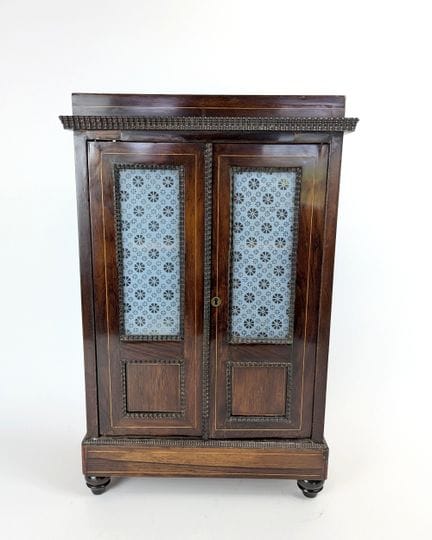 SMALL MAITRISE'S or doll's CABINET, in veneered wo