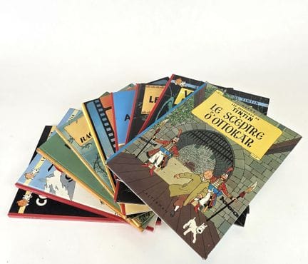 HERGE
21 full-color Tintin comic books and manuals