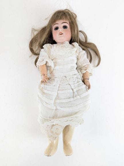 DEP
DOLL with an glazed porcelain head and open mo