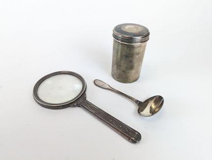 SET DI TRE OGGETTI in argento (950), composto da: 