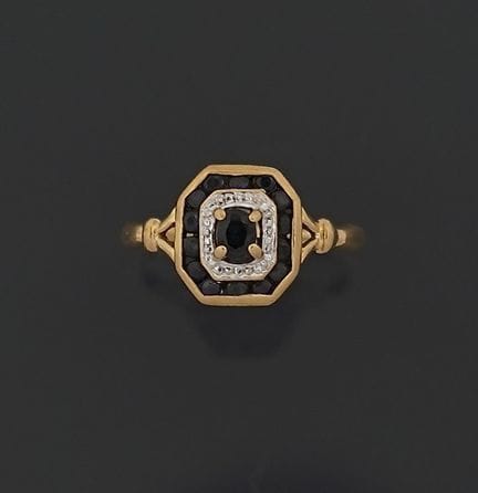Ring aus 18 Karat Gelb- und Weißgold (750er) mit a