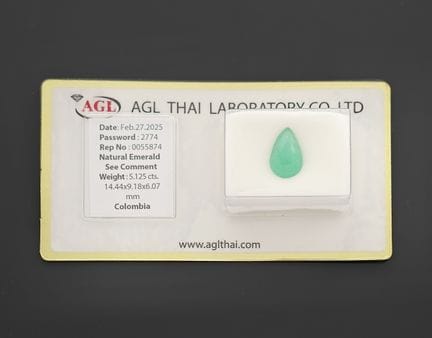 A 5.12-carat emerald on paper.
Accompanied by its 