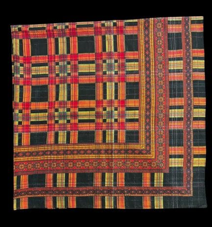 YVES SAINT LAURENT 
Cotton scarf with a checkered 