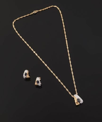 CARVEN 
Halbes Schmuckset in zwei Farbtönen aus 18