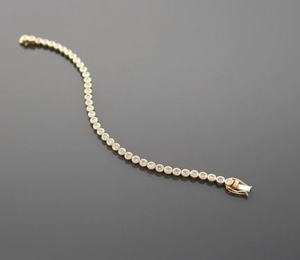 Tennisarmband aus 18 Karat Gelbgold (750 Tausendst