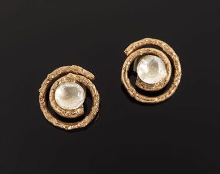 Coppia di orecchini a clip in metallo dorato a for